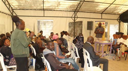 Mr. Bildad Mulanda of KNCHR capacity building the hosts and the refugees from the Embakasi area 